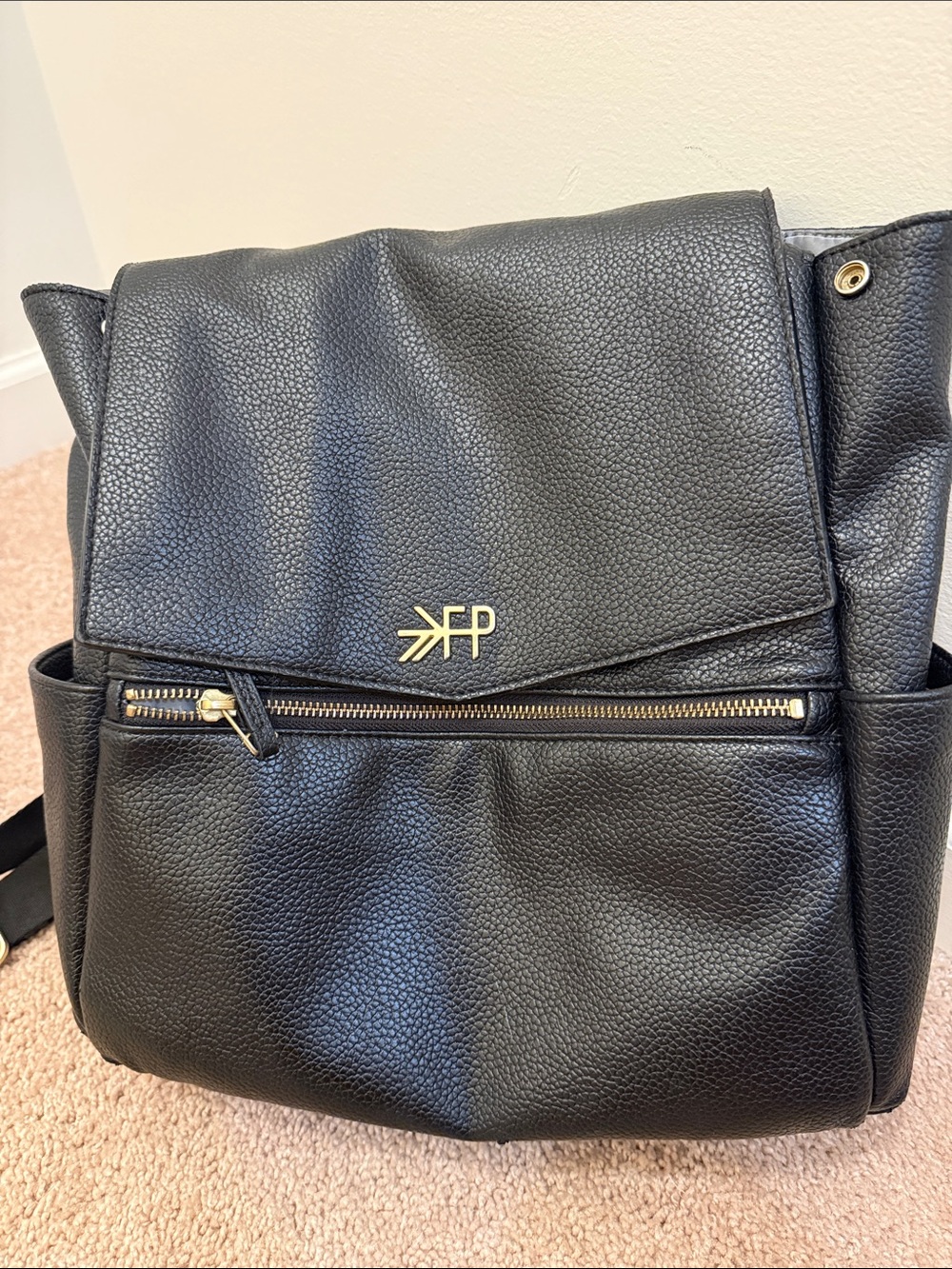 Freshly picked black leather diaper bag